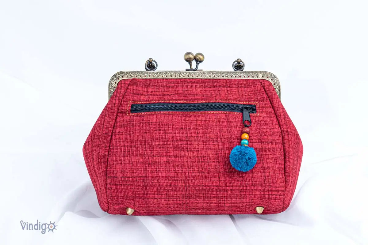 Vindigo red hemp handbag with back zipper pocket and blue tassel