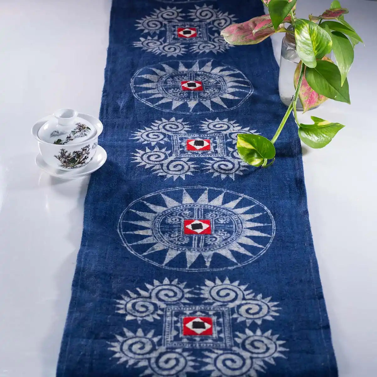 Vindigo batik table runner top-down view showing full Hmong pattern