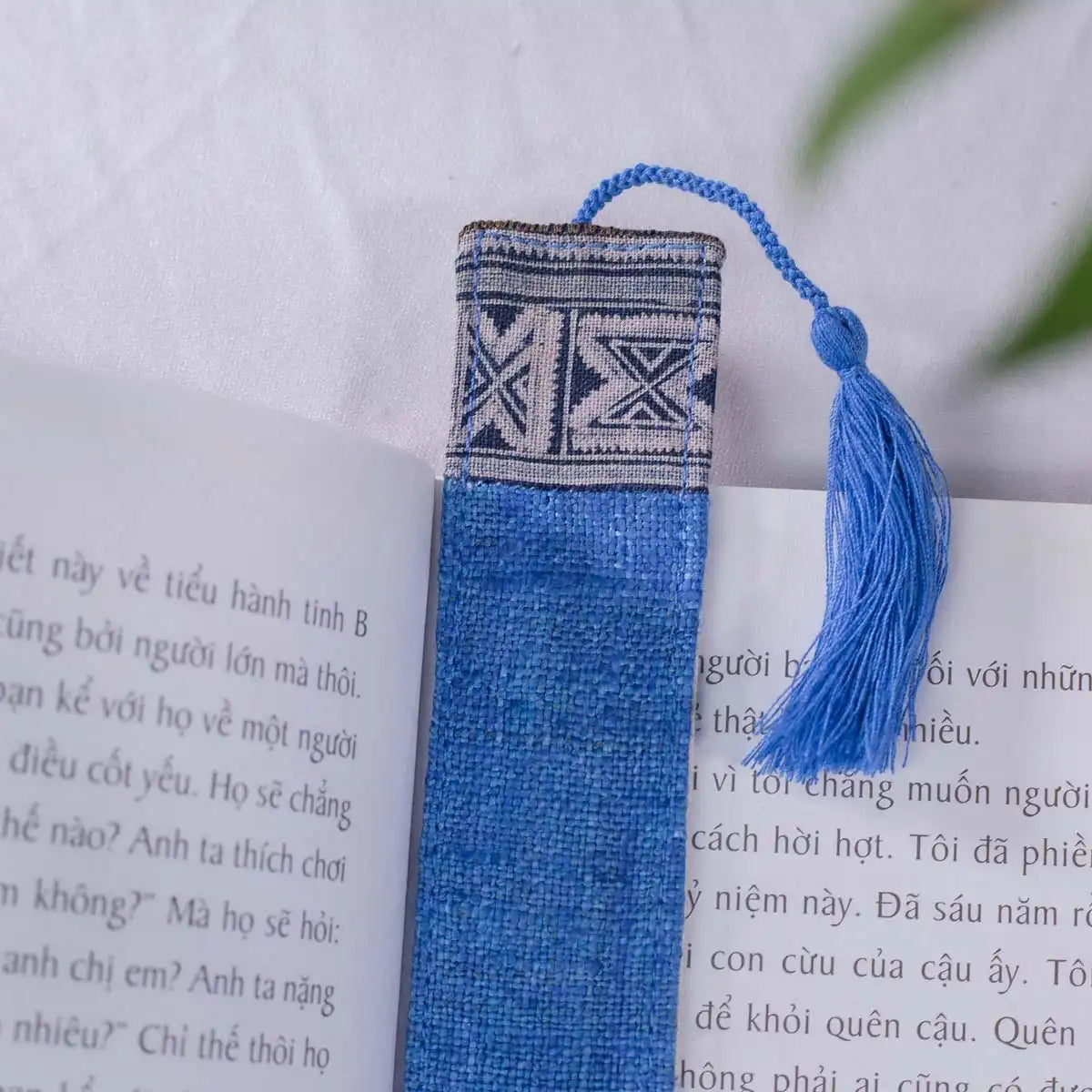 Vindigo blue hemp batik pattern bookmark side angle on book