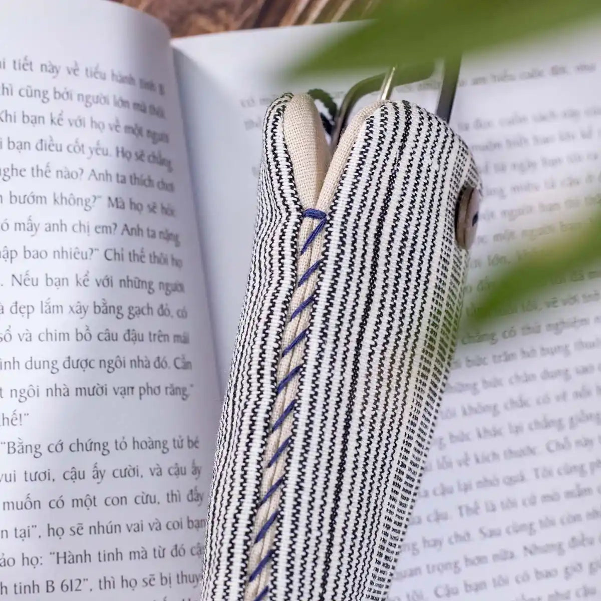 Vindigo striped phone case with phone partially inserted