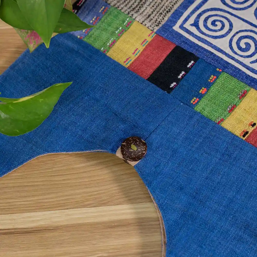 Vindigo shoulder bag blue hemp button and stripe detail close-up