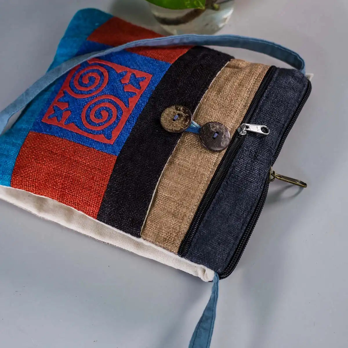 Vindigo hemp crossbody bag red and blue spiral pattern detail