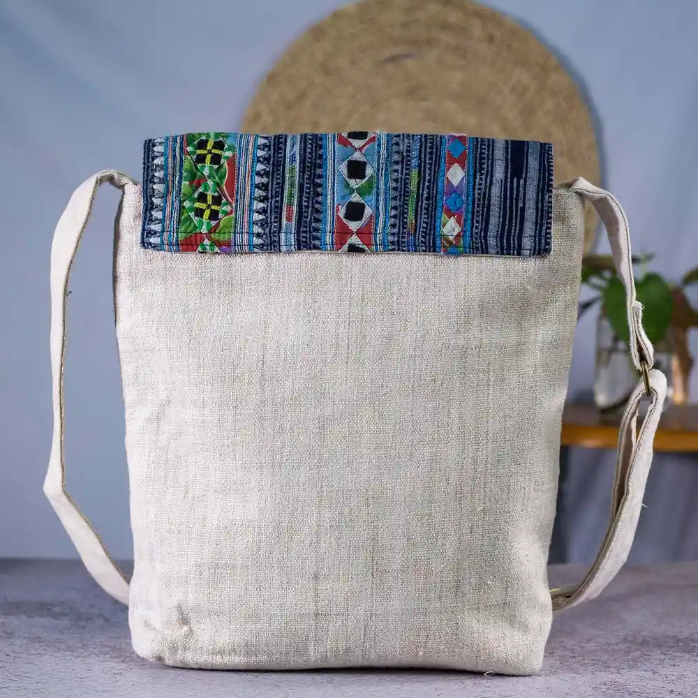 Vindigo natural hemp crossbody bag with blue batik pattern front view