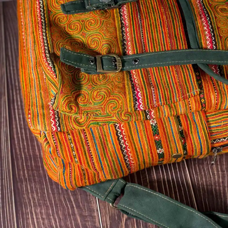 Vindigo yellow embroidered cotton backpack close-up detail