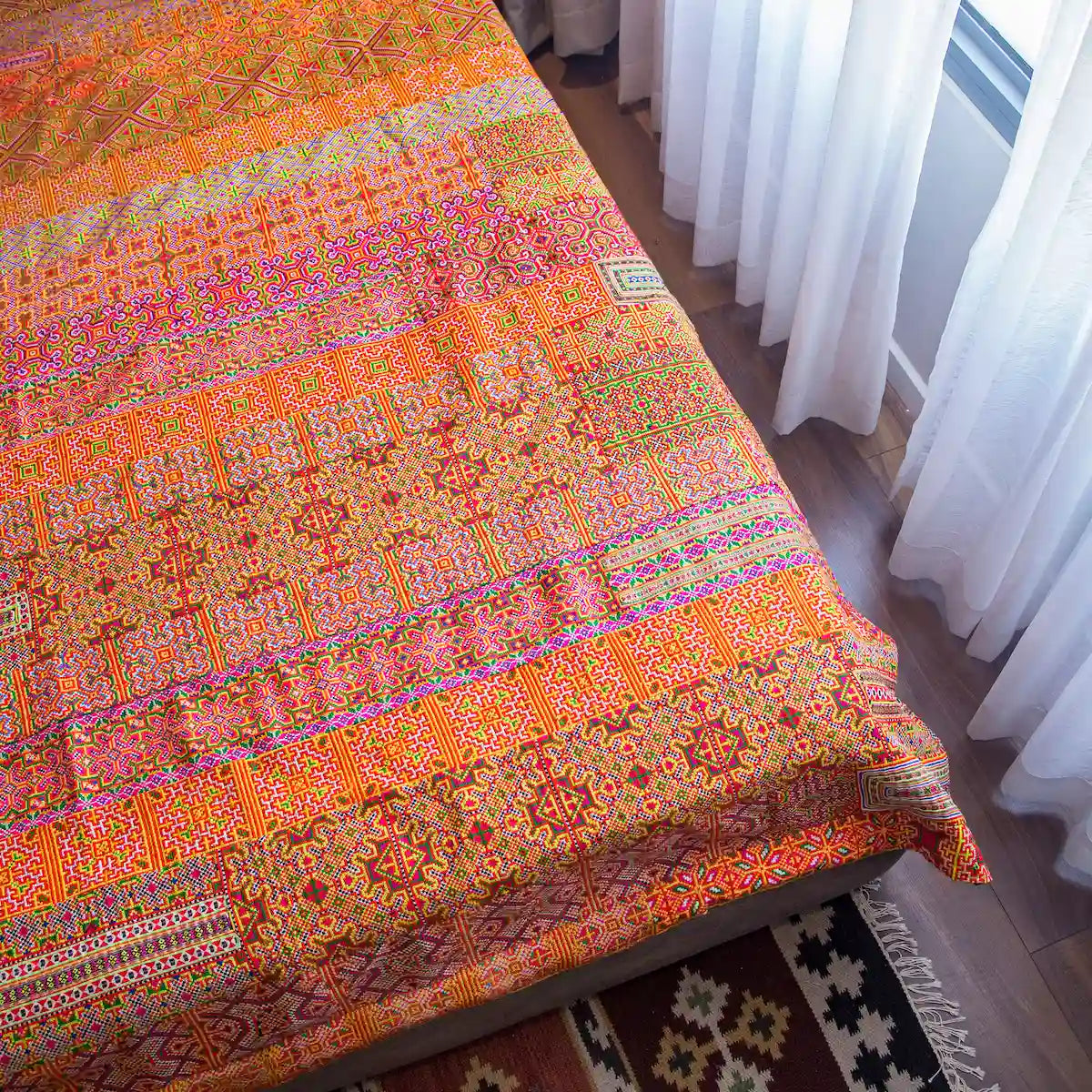 Vindigo orange and purple Hmong cotton bed cover embroidery detail