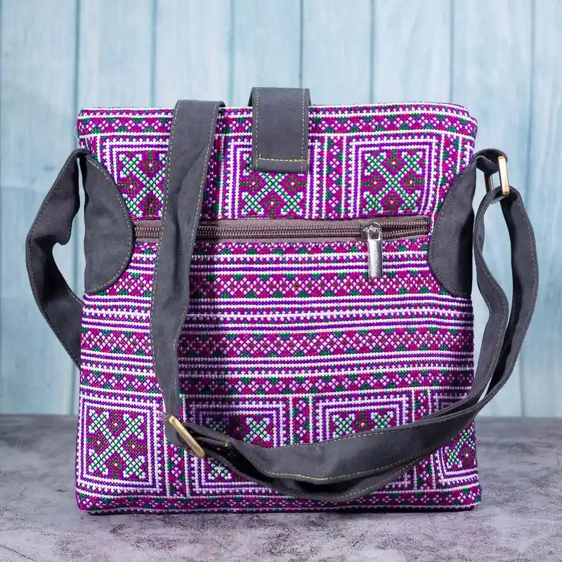 Vindigo purple embroidered crossbody bag back view with brown zipper pocket