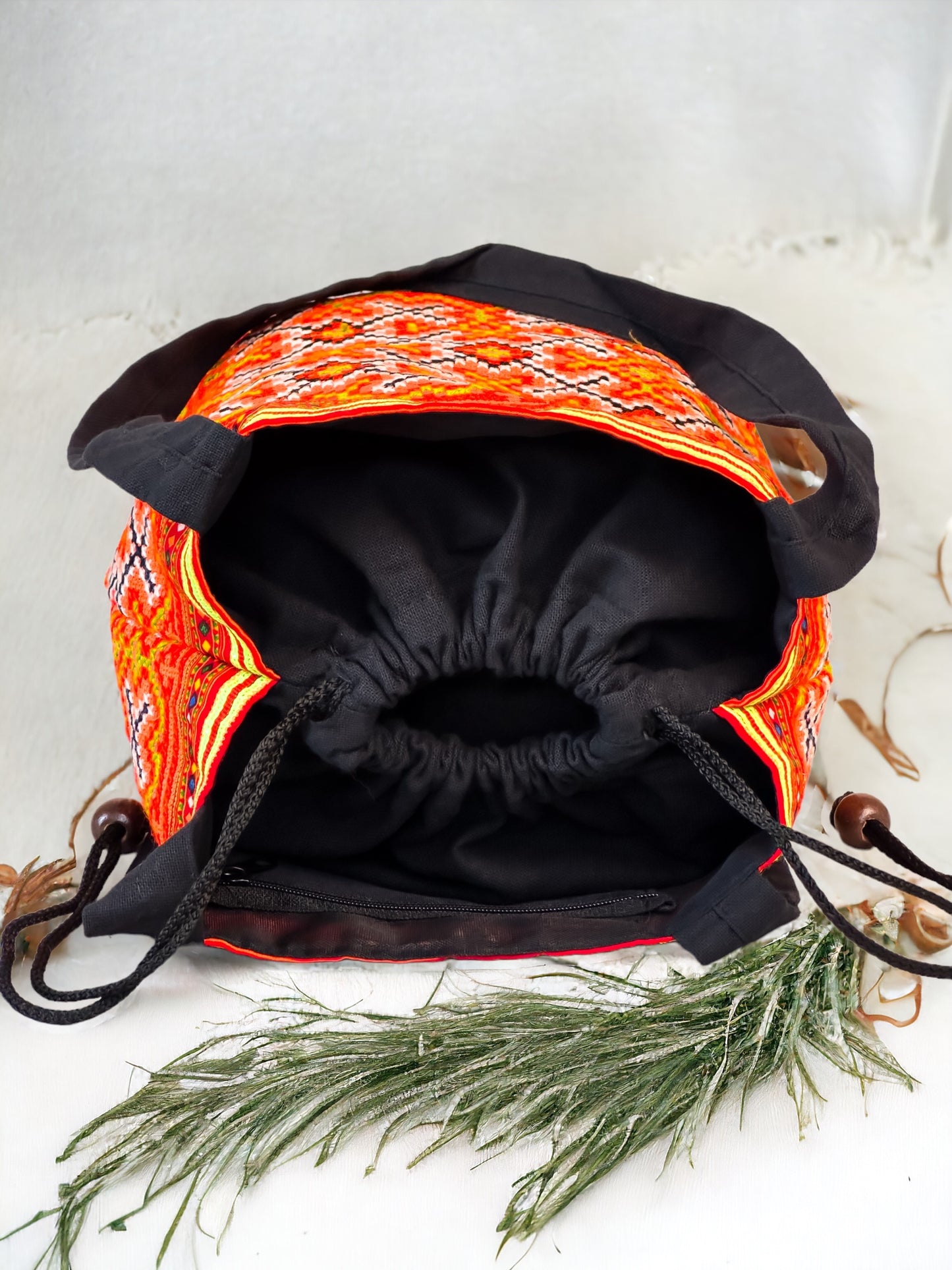 Orange embroidery shoulder bag with string to close