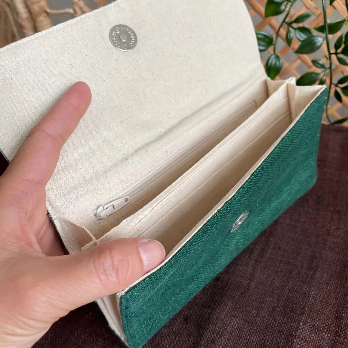 Vindigo long purse emerald hemp contrast pattern inside view with hand