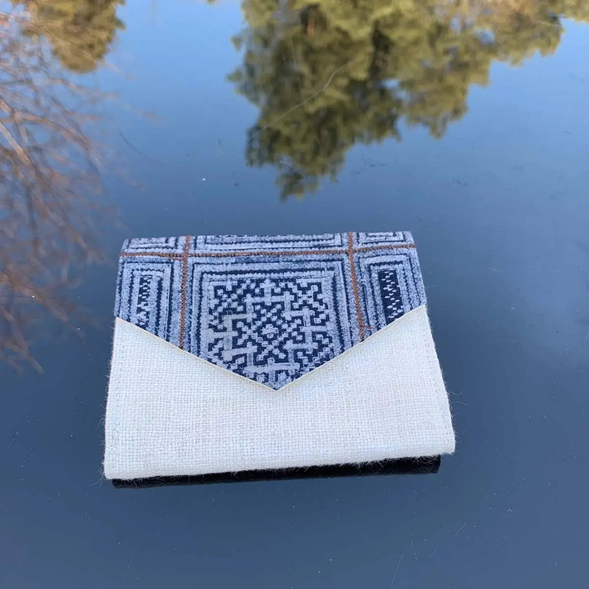 Vindigo wallet front view with geometric batik design