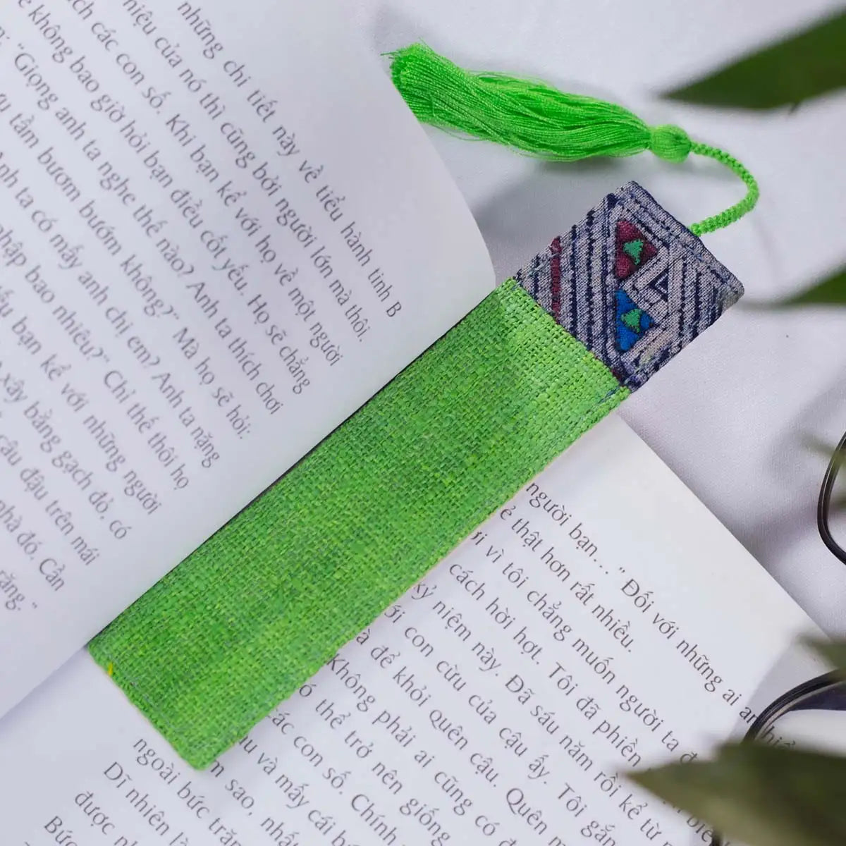 Vindigo light green hemp batik pattern bookmark side angle on book