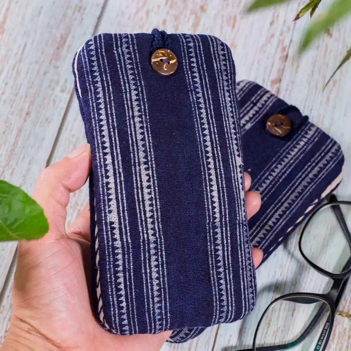 Vindigo striped indigo phone case held in hand