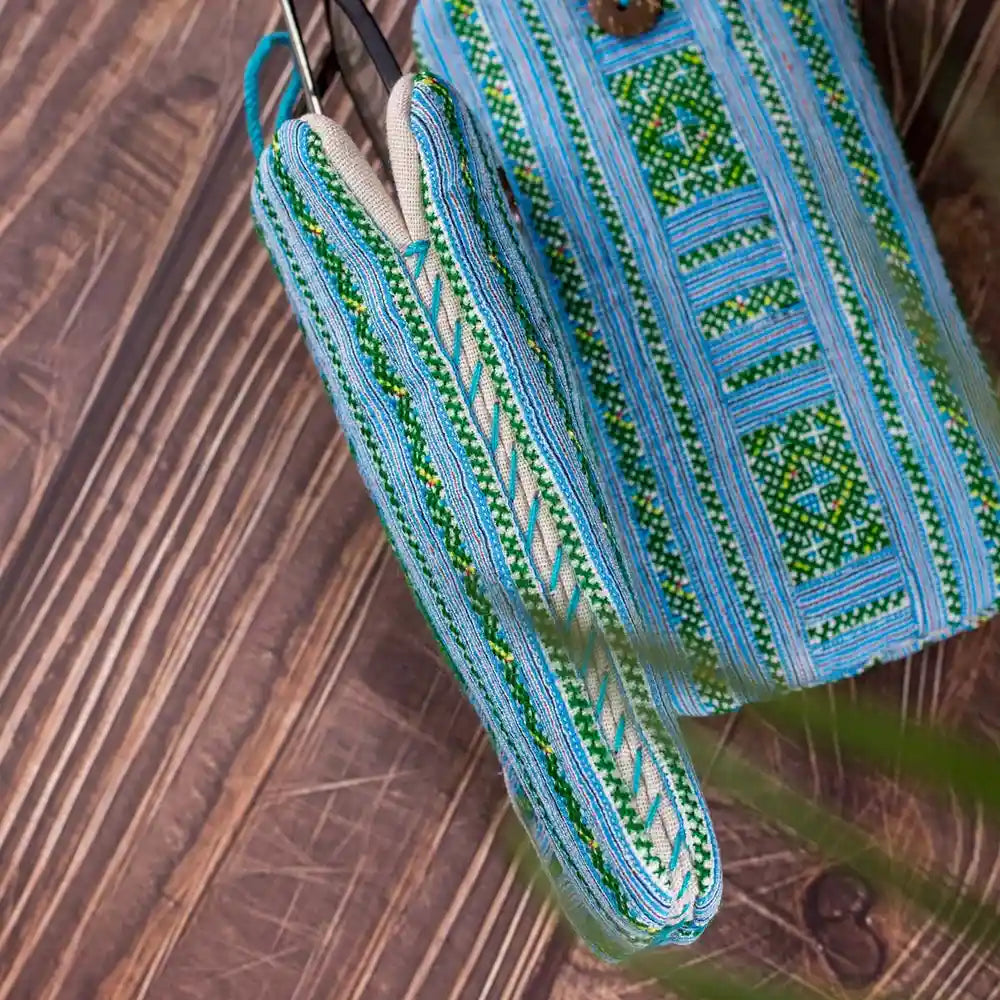 Vindigo phone case showing embroidered texture side view