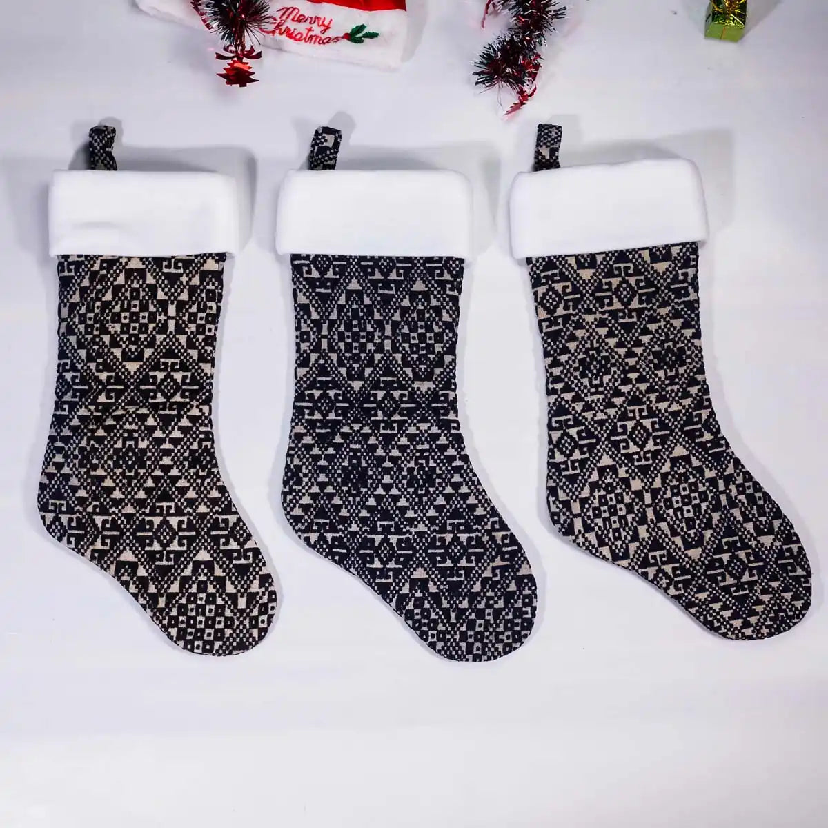 Vindigo H’mong embroidered black Christmas stockings front angle