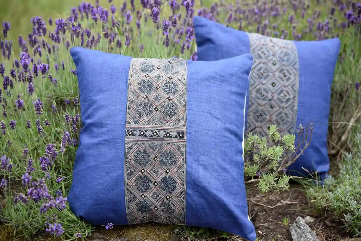 Pair of lavender blue cushions with ethnic panel outside