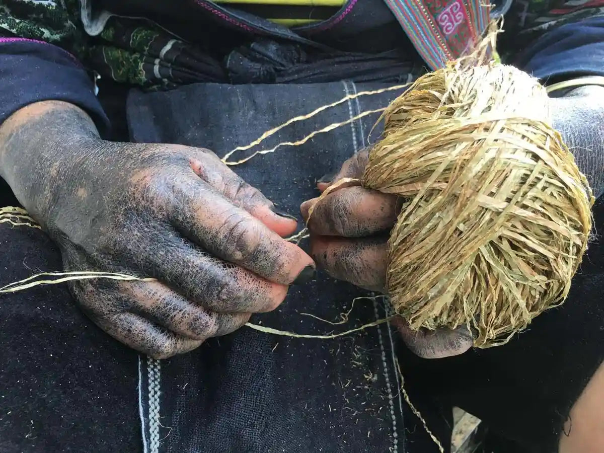 Vindigo artisan preparing hemp fiber yarn by hand