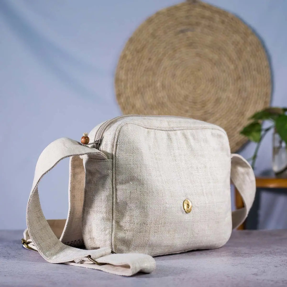 Vindigo beige hemp crossbody bag back view with brass zipper