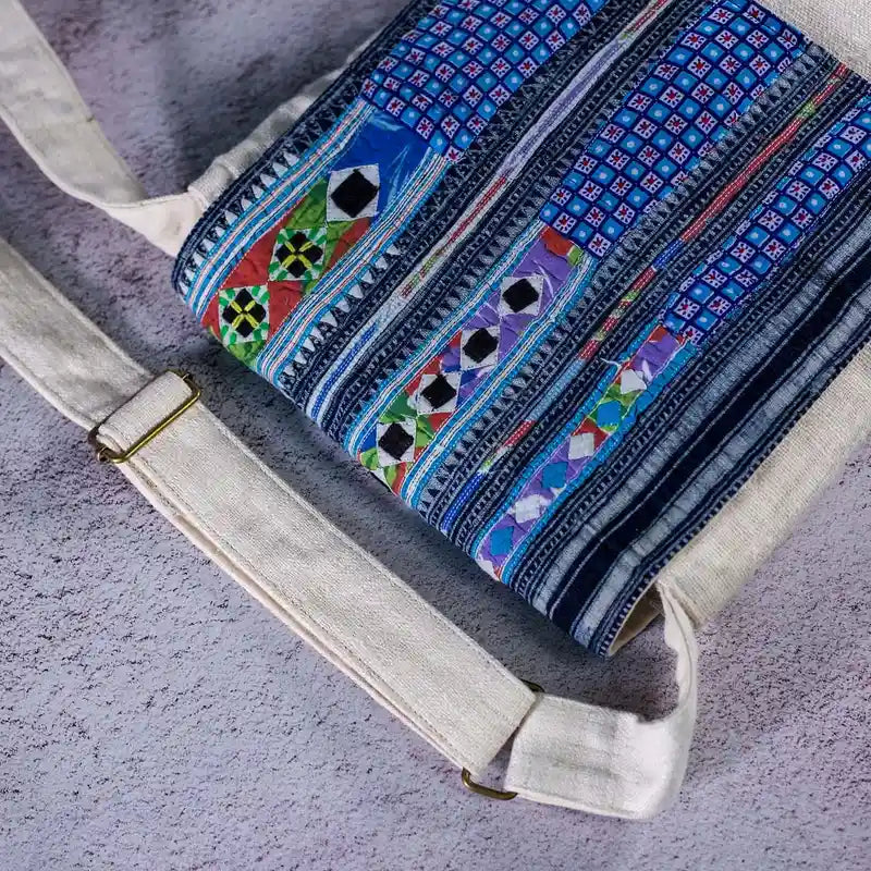 Vindigo blue batik hemp crossbody bag close-up of hand-stitched flap