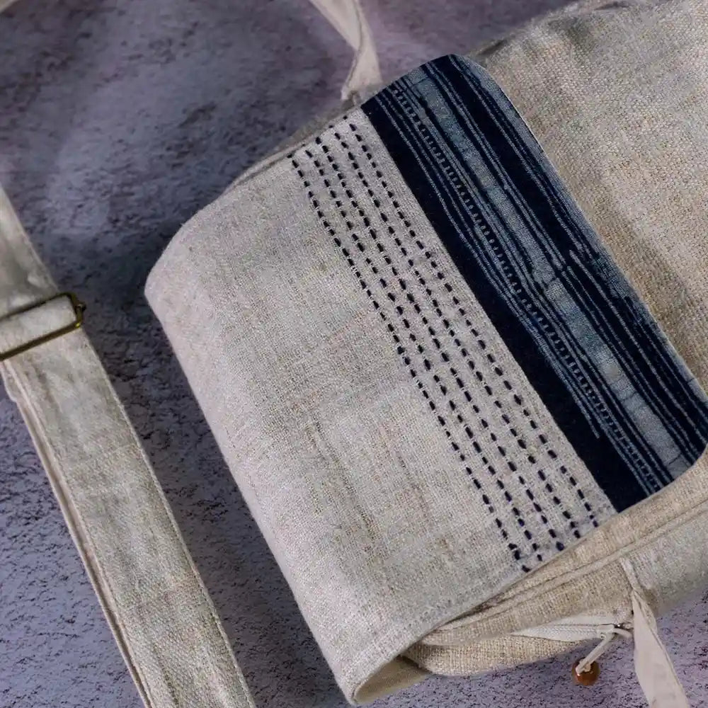 Vindigo beige hemp crossbody bag close-up of indigo batik and stitching