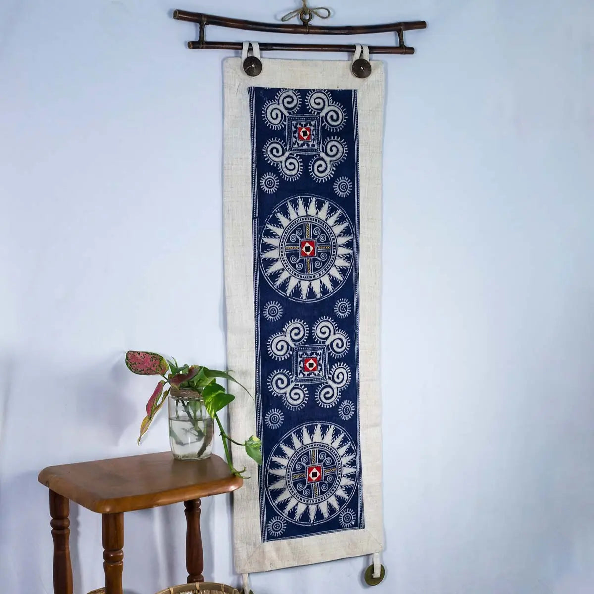 Vindigo indigo hemp batik tapestry displayed on wall with decor
