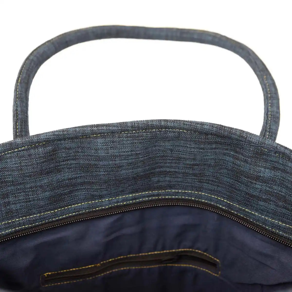 Vindigo tote interior with dark cotton lining and handles