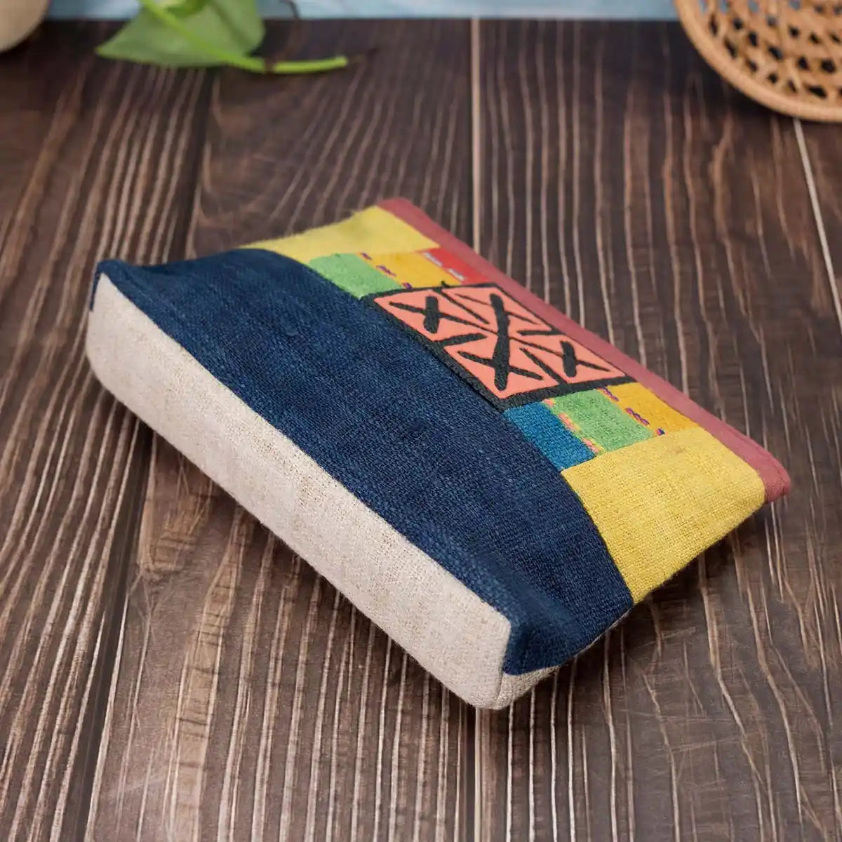 Vindigo hemp cosmetic bag side view highlighting handwoven patchwork details