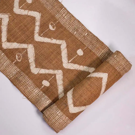 Vindigo brown tribal zigzag fabric roll folded view