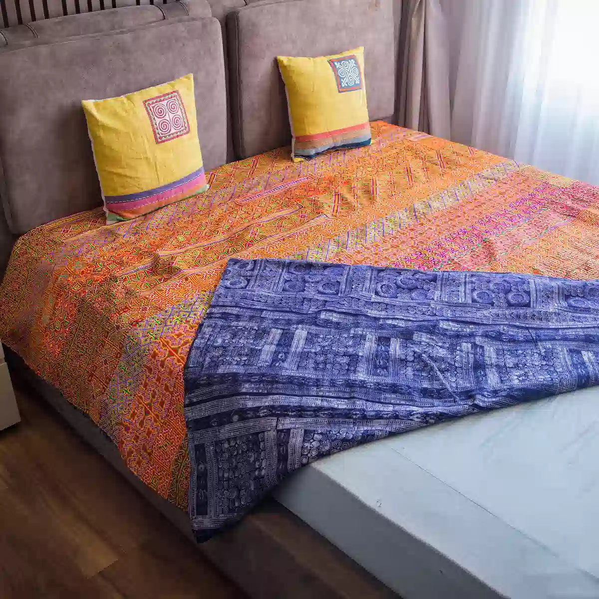 Vindigo dual-sided orange and indigo cotton bed cover lifestyle scene