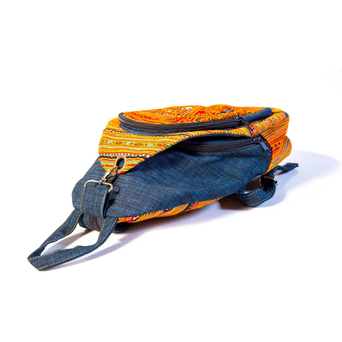 Vindigo orange hemp embroidered backpack lying flat view