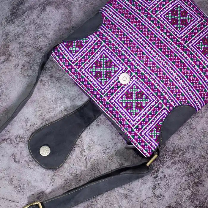 Vindigo purple embroidered crossbody bag flat lay showing magnet flap and tribal motifs