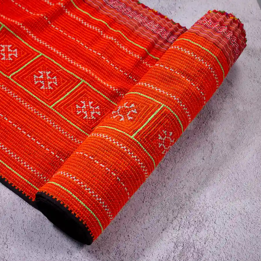 Vindigo handmade red hemp tribal embroidered fabric roll side angle