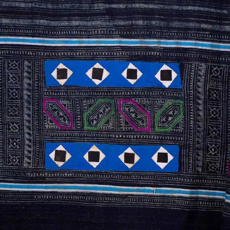Vindigo Hmong black fabric close-up with diamond shapes and central panel