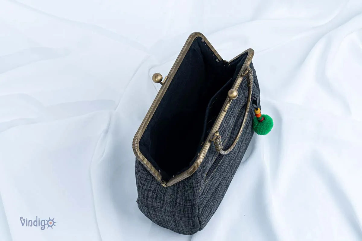 Vindigo black embroidered handbag open top showing interior space