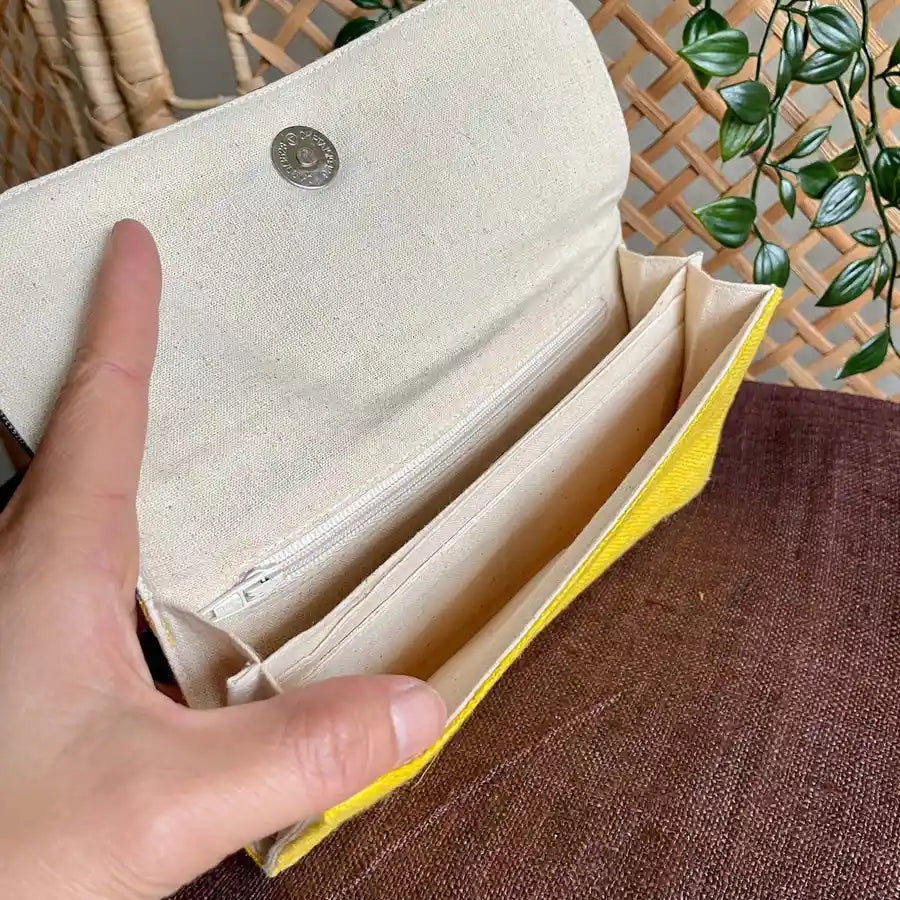 Vindigo long purse yellow hemp diamond pattern inside view with hand