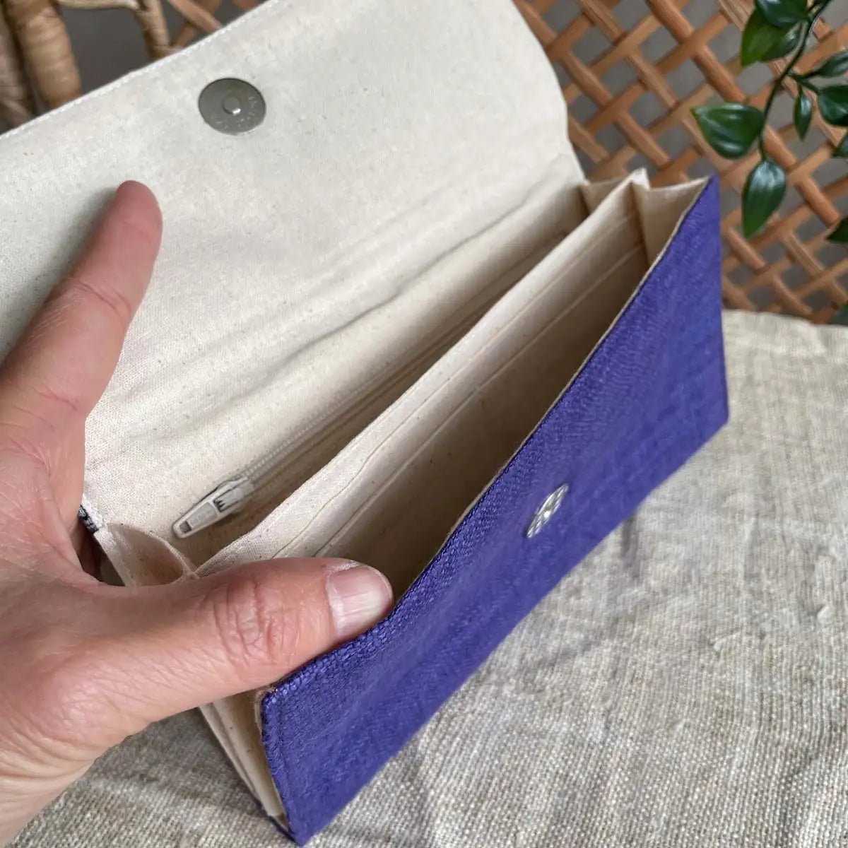 Vindigo long purse purple hemp square pattern inside view with hand
