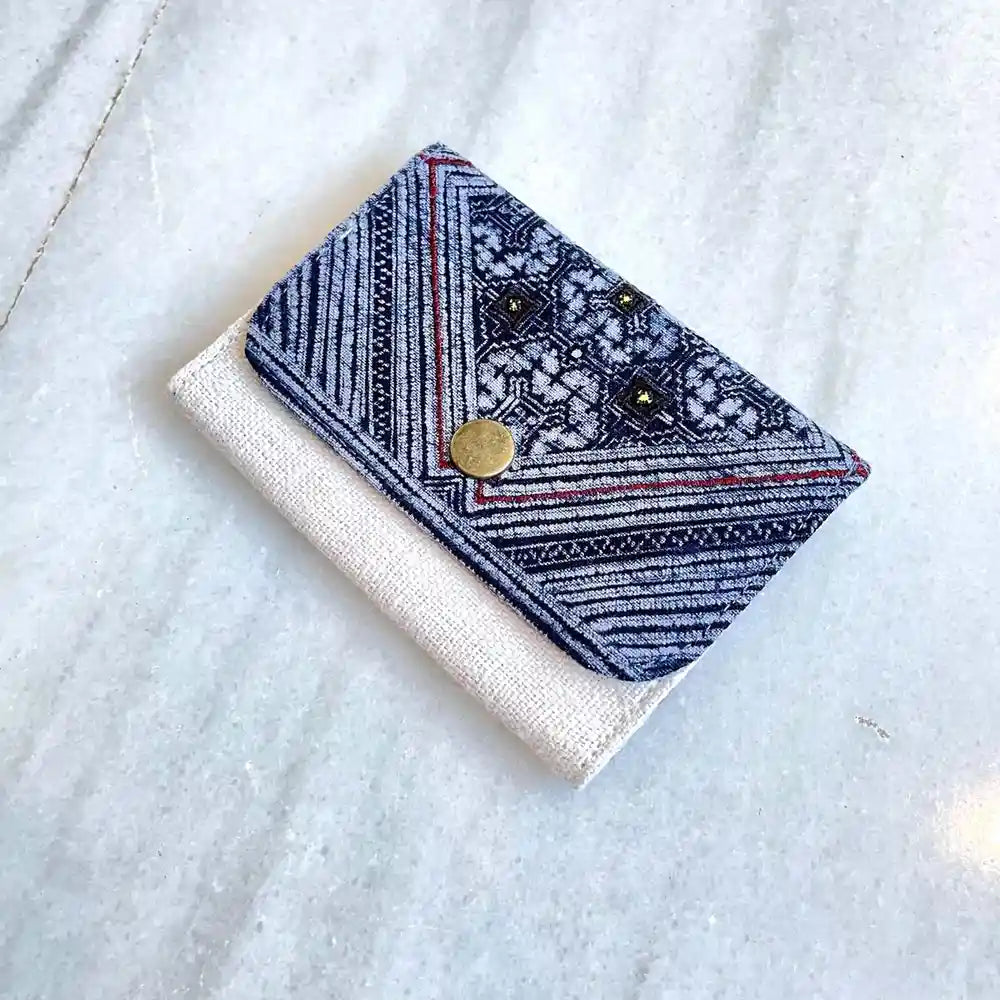 Vindigo handmade cardholder with triangle batik flap angled view