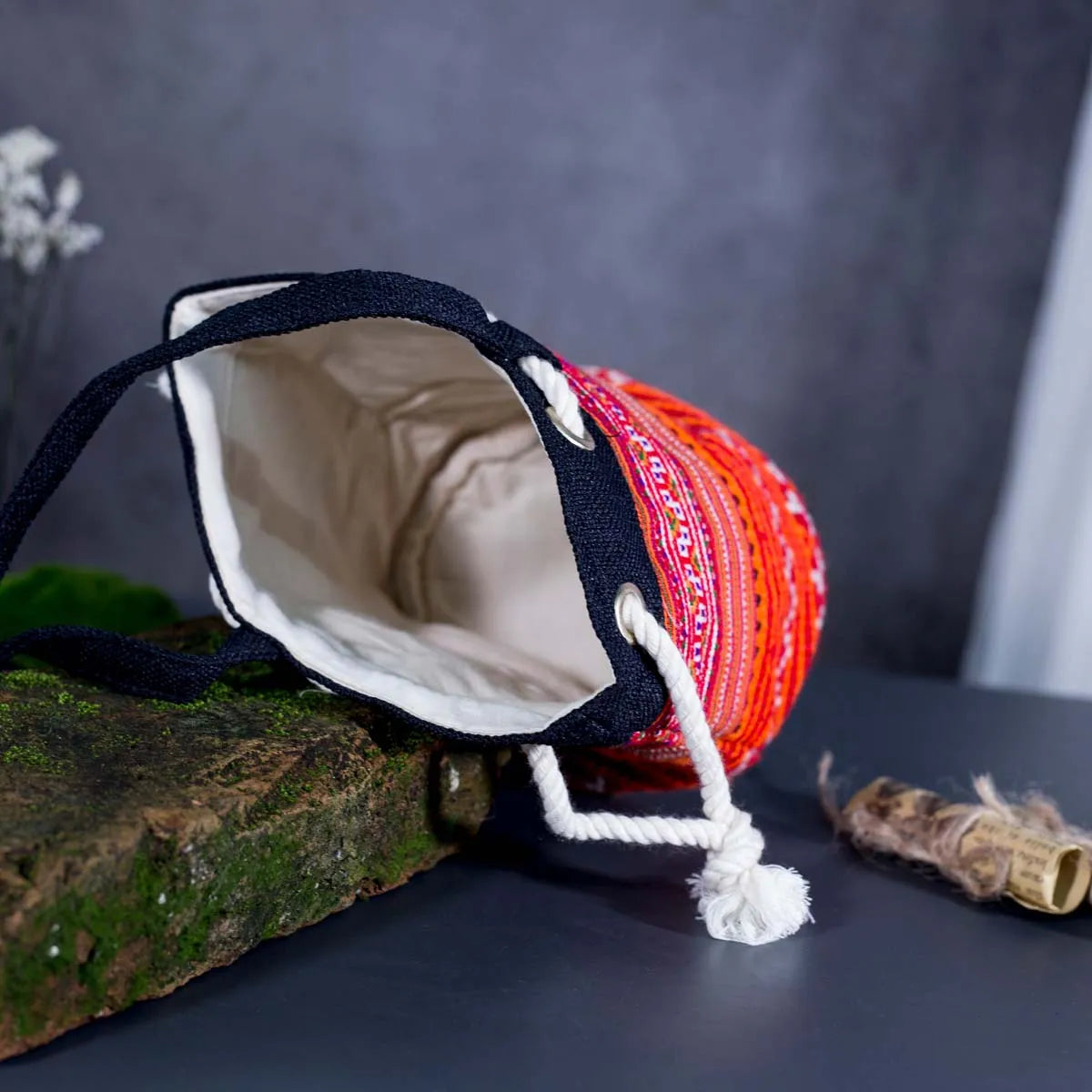 Inside view of Vindigo orange hemp tribal embroidered bucket bag