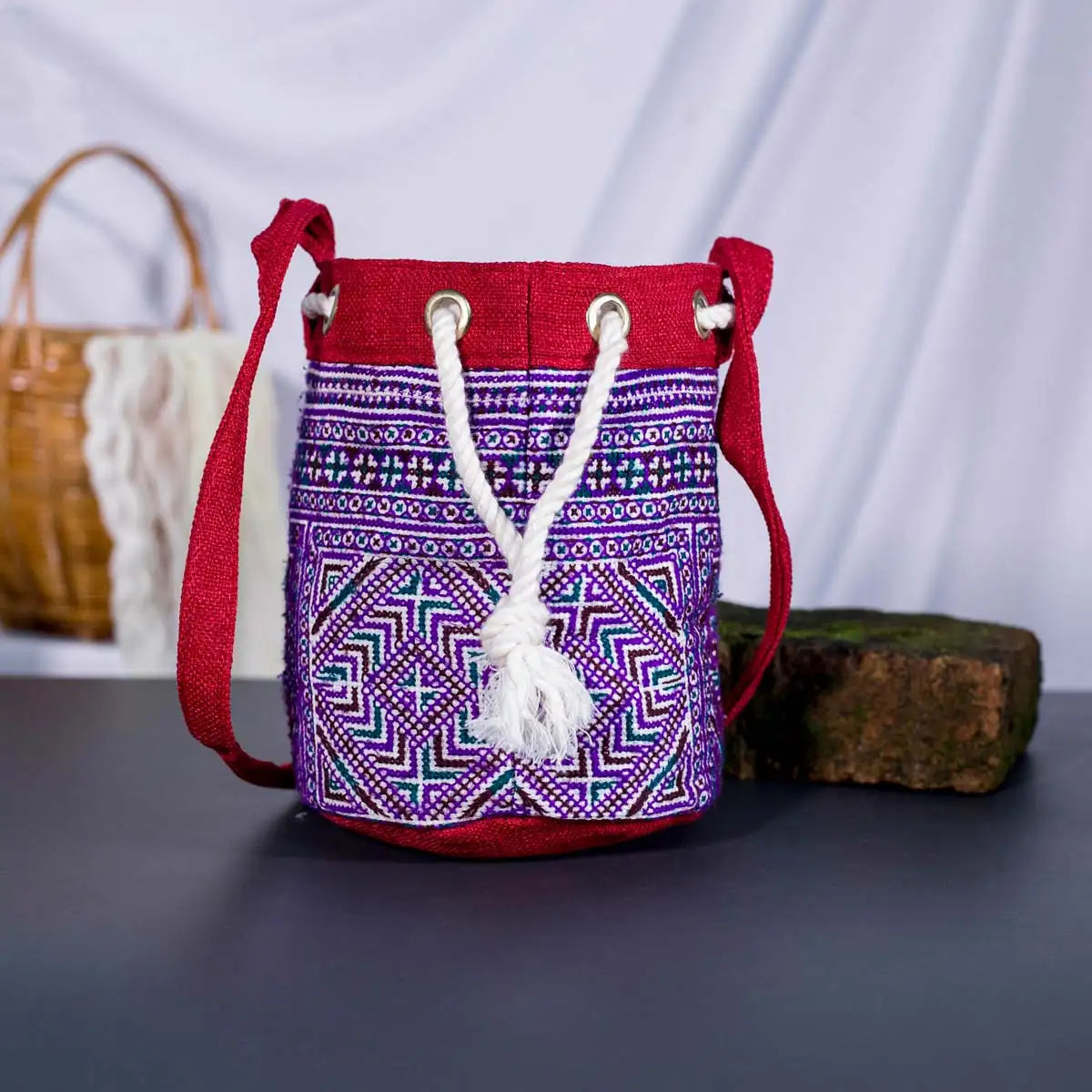 Vindigo red hemp geometric bucket bag side angle view