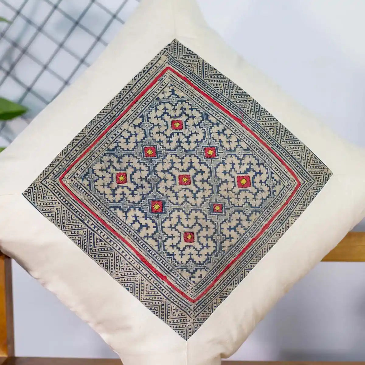 Vindigo beige cotton cushion cover floral pattern close-up detail