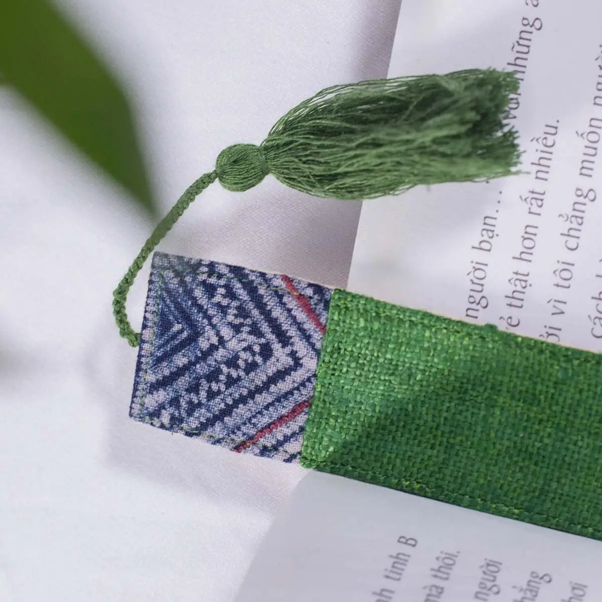 Vindigo green hemp bookmark close-up with embroidered top