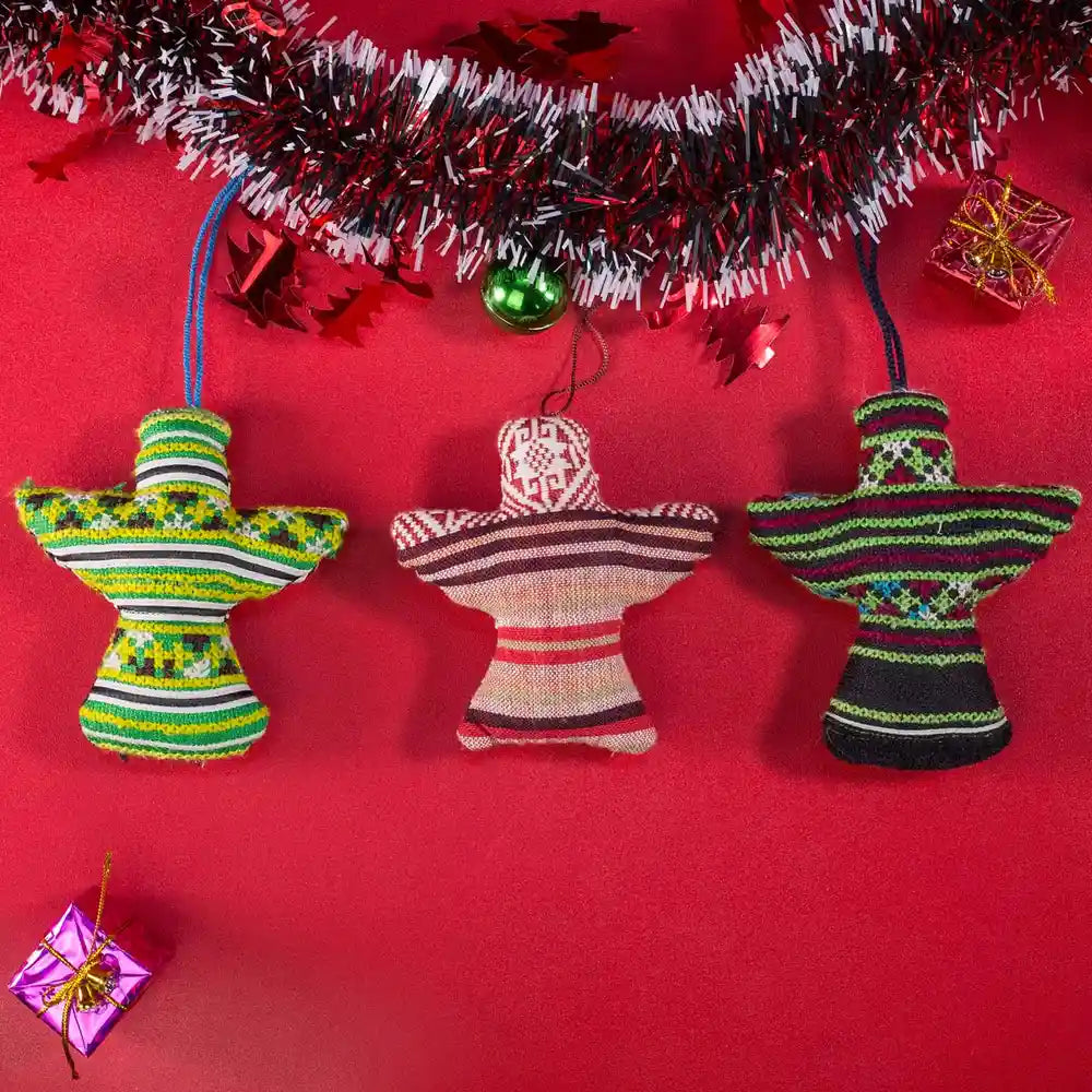 Vindigo green and red tribal embroidered ornaments hanging under garland