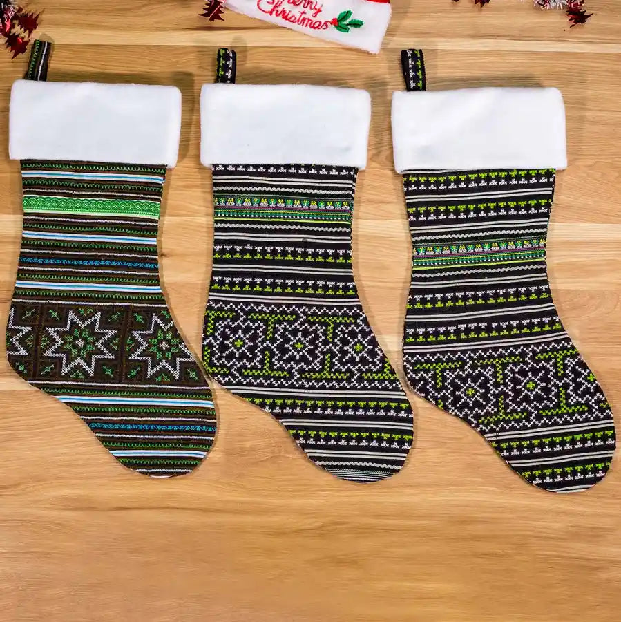 Vindigo set of green tribal embroidered Christmas stockings front view