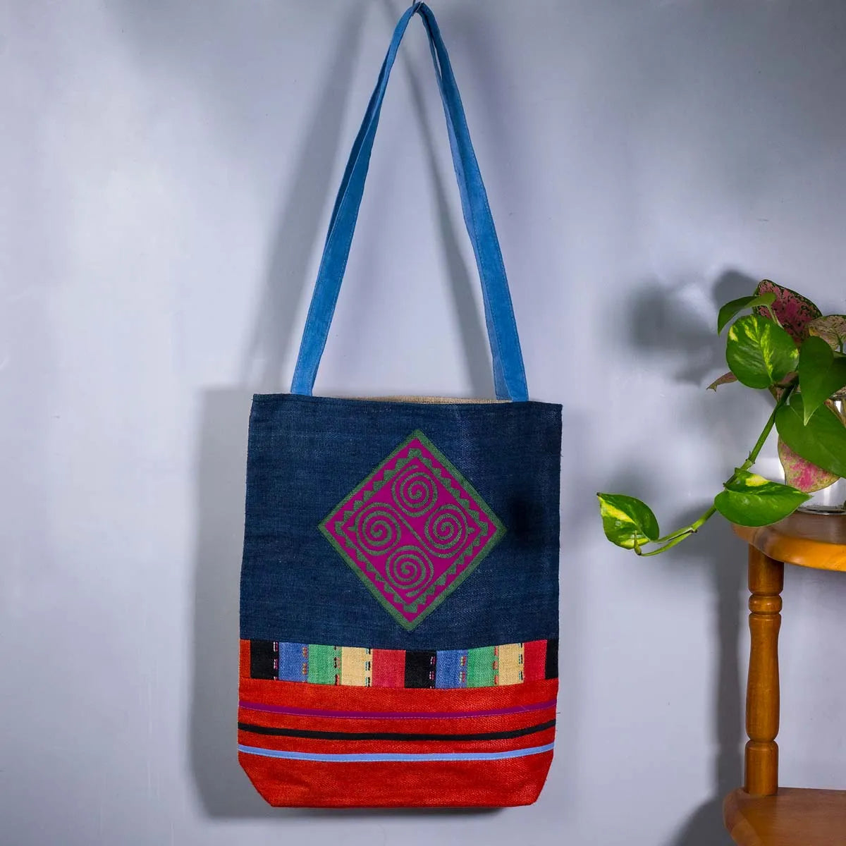 Vindigo shoulder bag indigo hemp pink spiral patch full front hanging view