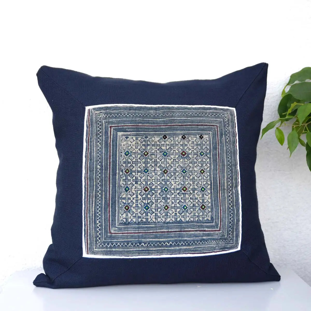 Alternate front view of indigo cushion cover with geometric tribal motif