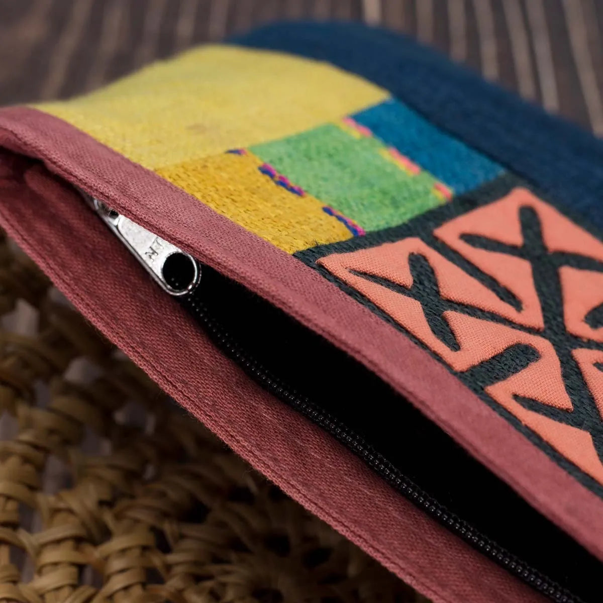 Vindigo hemp cosmetic bag zipper and embroidery detail close-up view