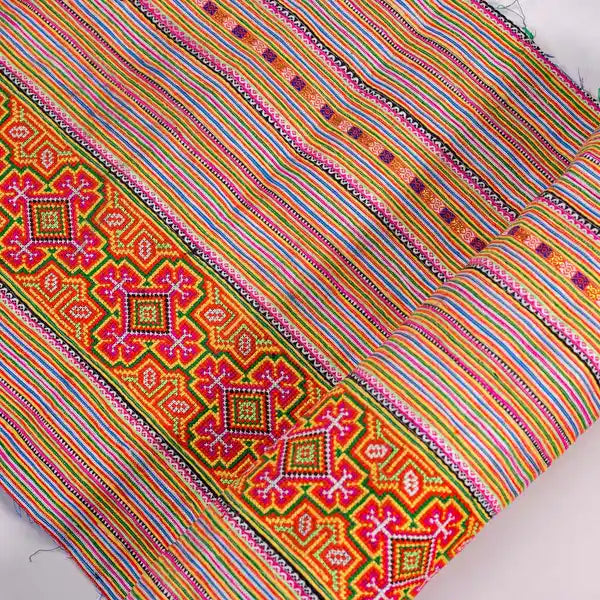 Vindigo orange cotton striped fabric with geometric embroidery close-up