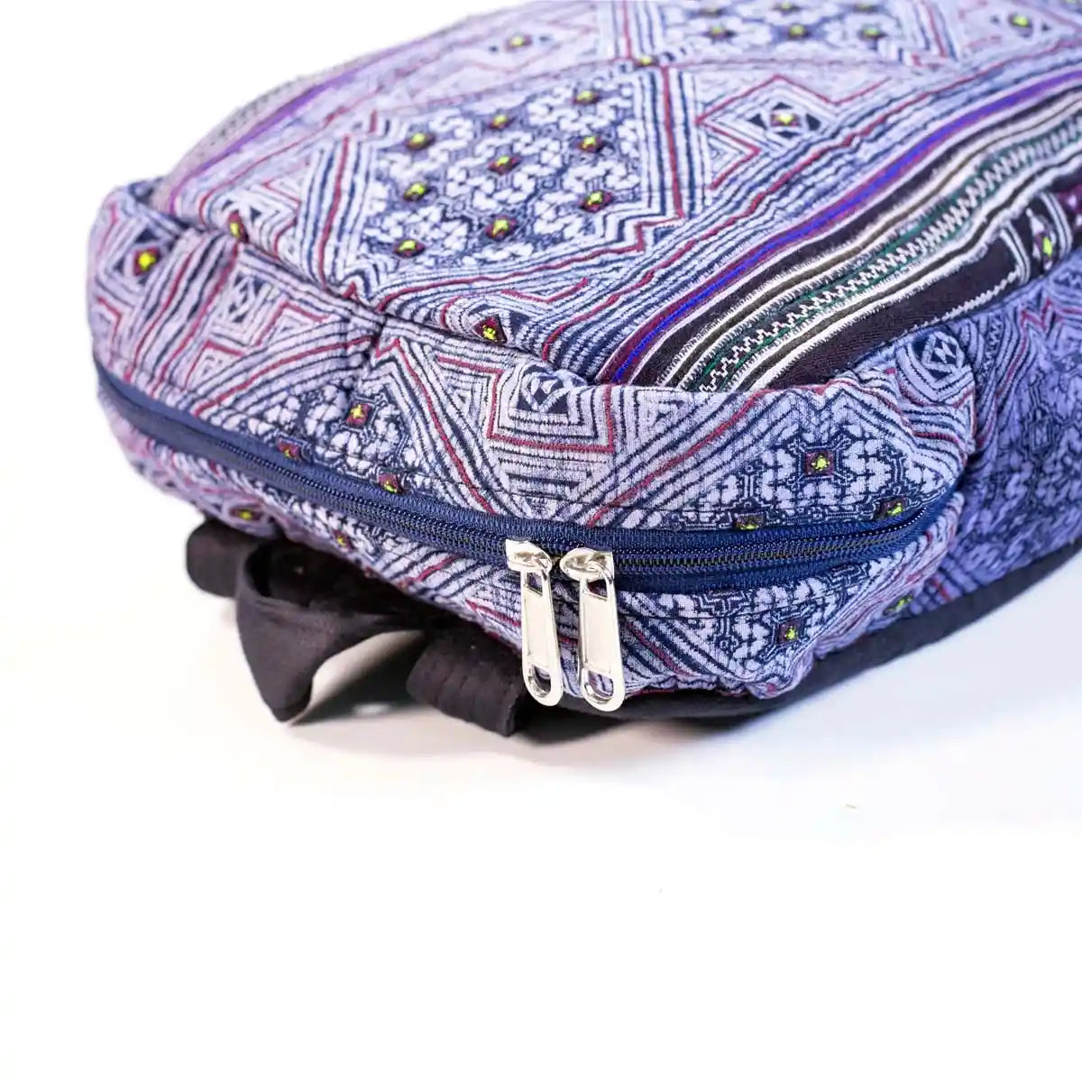 Vindigo embroidered purple hemp backpack side close-up detail