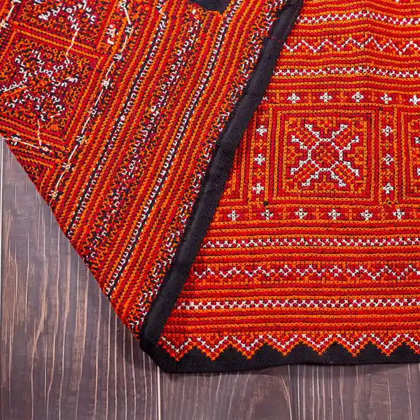 Vindigo red hemp fabric roll with tribal stitched patterns top view