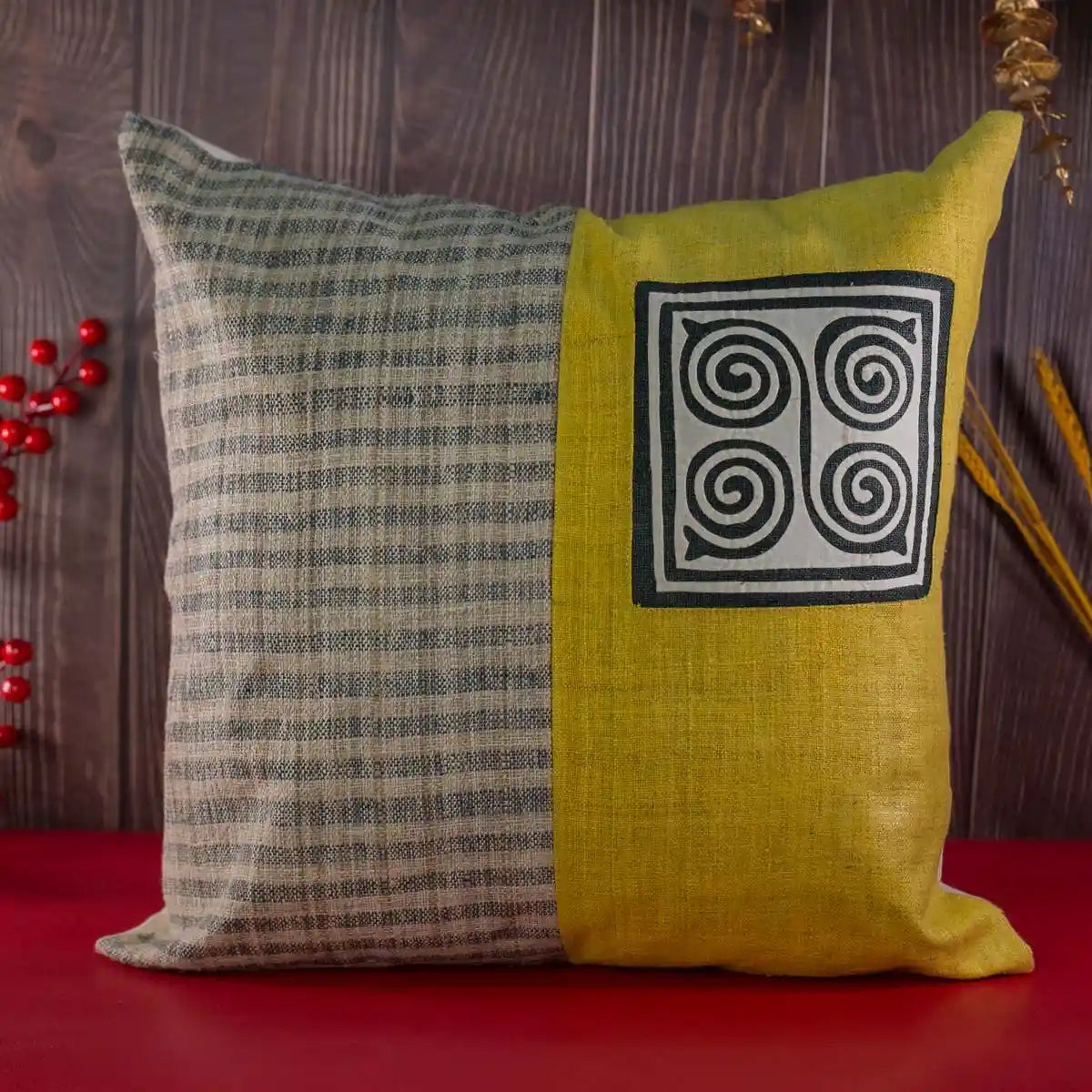 Vindigo yellow hemp cushion cover lifestyle display with spiral patch