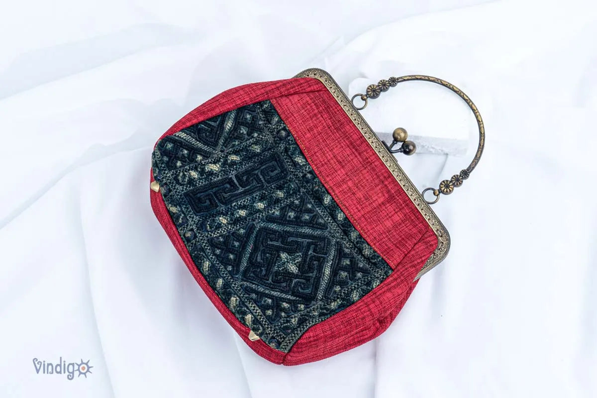Vindigo red hemp handbag with vintage embroidered panel side angle
