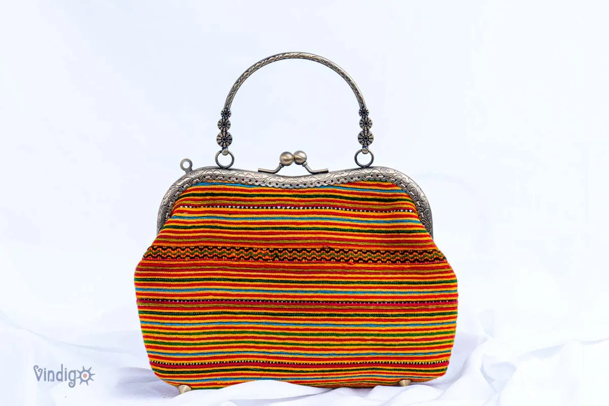 Vindigo H’mong striped embroidery handbag with kiss-lock copper frame
